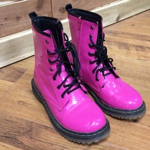 Pink and black combat boots
